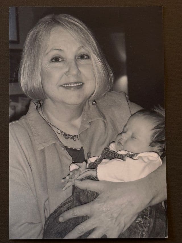 Hazel holding baby Ella